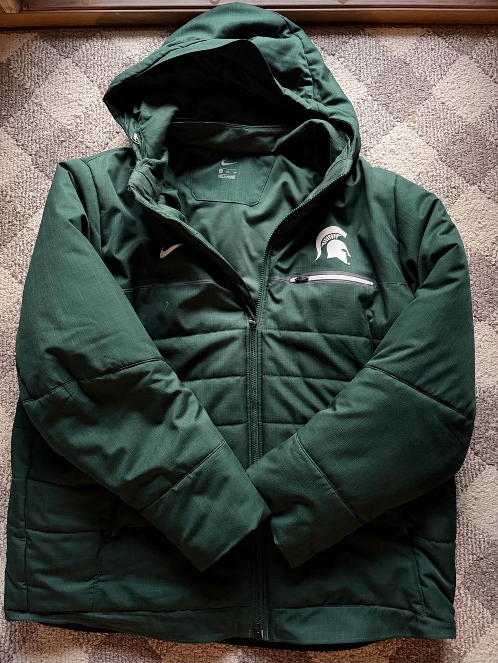 Nike Men's Dark Green Hooded Puffer Jacket with Spartan Logo